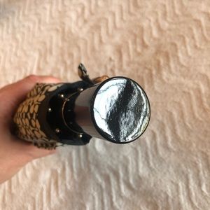 Like new never used Coach umbrella!